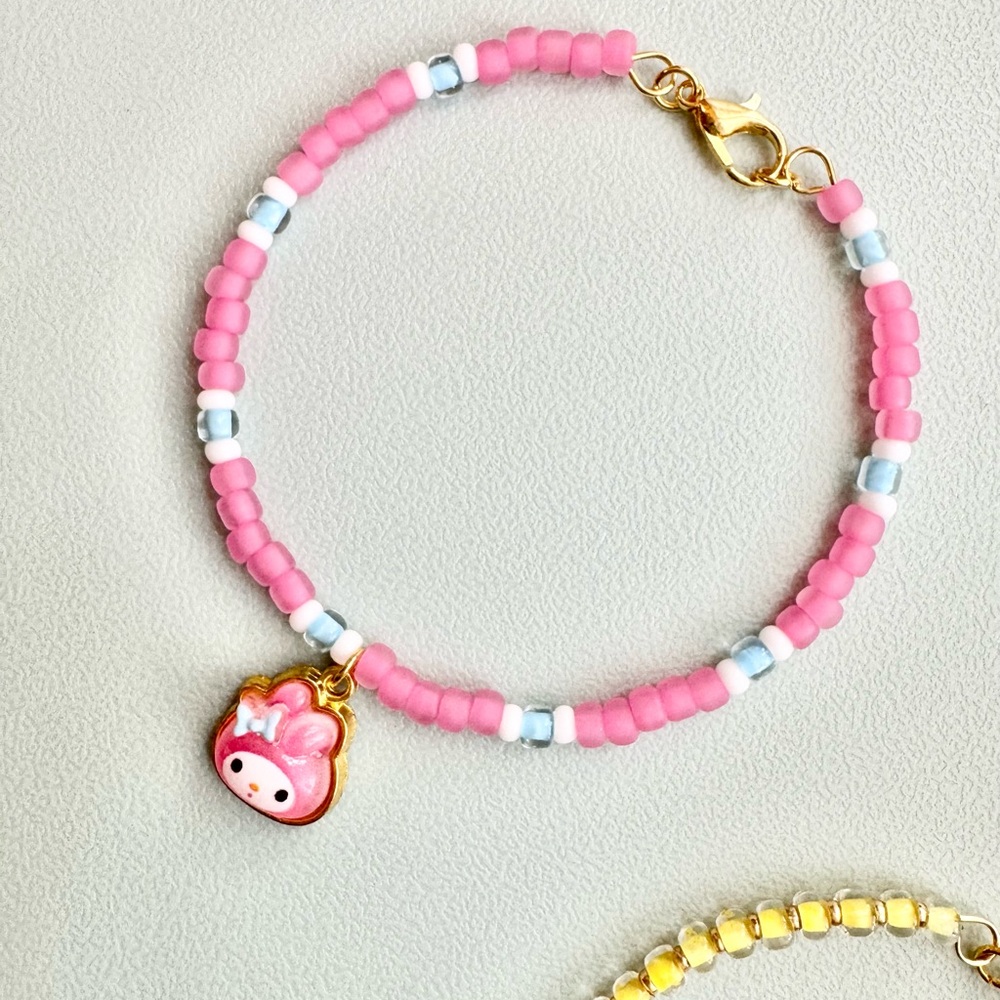 Pink and White Beaded Bracelet with Heart Charm